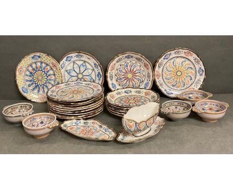 A selection of French Quimper ware to include plates and bowls, various patterns AF 