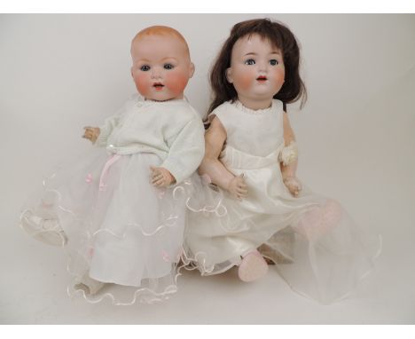 Armand Marseille Dream Baby bisque headed boy doll, mould mark 331/8K, moulded hair, rolling eyes, composition bent limb body