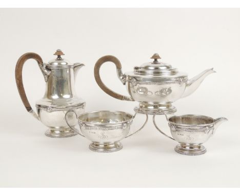 George VI silver four piece tea service, by CB&amp;S, Sheffield 1938/40, comprising teapot, hot water jug, sugar basin and mi