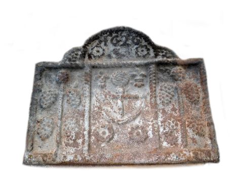 Cast iron Armada commemorative fire back, centred with a roped anchor, flanked with hop vines, and with a date of 1626 to the