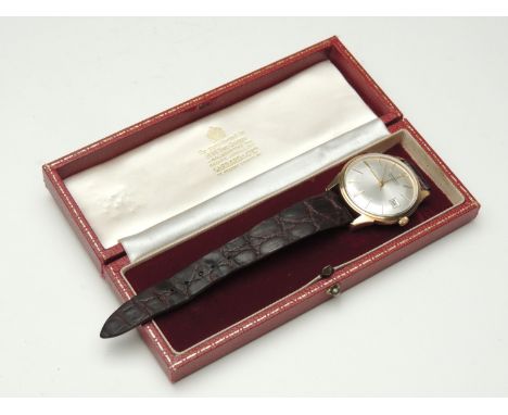 Garrard 9ct gold gent's automatic wristwatch, satin finish, 30mm dial with baton numerals and date aperture, the movement cur