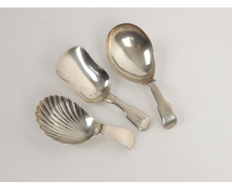 George III silver tea caddy spoon, London 1780, with scallop bowl, weight approx. 7g; also a George IV silver fiddle pattern 