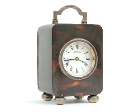 Edwardian silver mounted tortoiseshell travelling clock, for Finnegans, New Bond Street, hallmarked London 1908, French movem