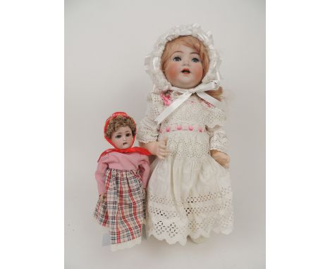 Kammer and Reinhardt/Simon and Halbig bisque headed doll, mould mark '126', sleeping eyes, open mouth with flickering tongue,