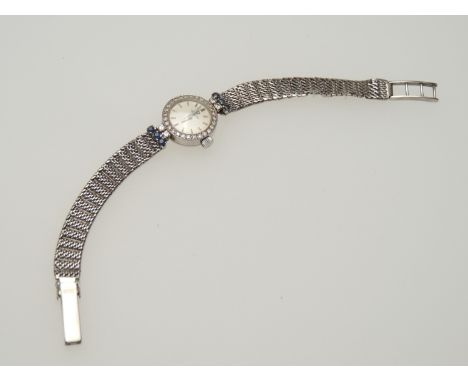 Omega lady's vintage 18ct white gold, diamond and sapphire wristwatch, signed 13mm dial with baton numerals, manual wind move