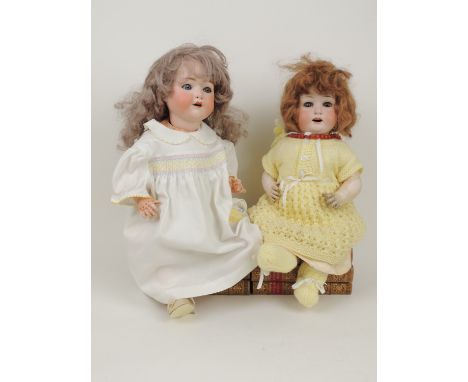 Heubach Koppelsdorf bisque headed doll, mould mark '267.7', sleeping eyes with lashes, composition bent limb body, 53cm; also