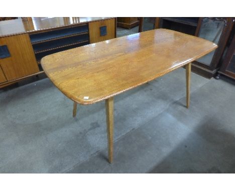 An Ercol style refectory table made by Centa, Denmark