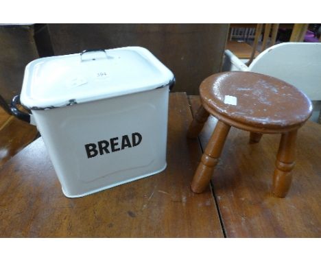 An enamel bread bin and a painted oak stool