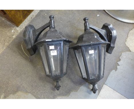 A pair of cast aluminium lantern lights