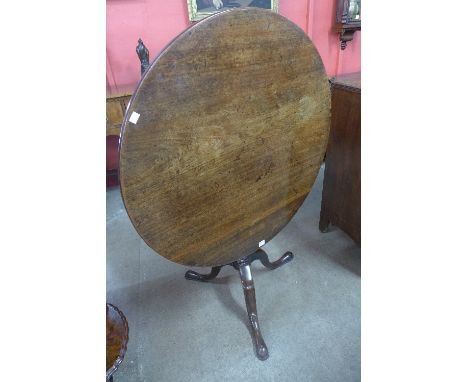 A George III mahogany circular tilt-top tripod table