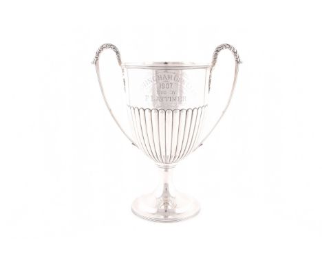 A Edward VII large silver twin handled trophy cup, hallmarked Birmingham 1904 by the Barker Brothers, round body with taperin