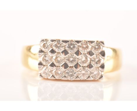An 18ct yellow gold and moissonite ring, set with fifteen round brilliant-cut moissonite gemstones, the ring head measuring a