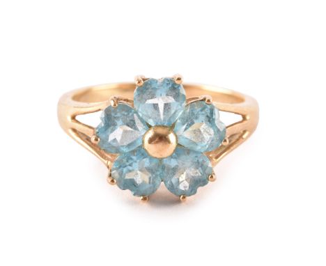 A 9ct yellow gold and blue topaz floral cluster ring, set with five mixed heart-cut topaz, flowerhead approximately 12 mm, si