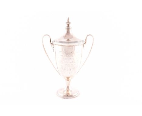 A Edward VII silver trophy cup and cover, hallmarked Birmingham 1908 by Elkington &amp; Co Ltd, twin round body with tapering