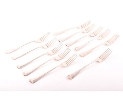 A collection of silver dinner forks including seven George III dinner forks, hallmarked London 1806 of various maker's, three