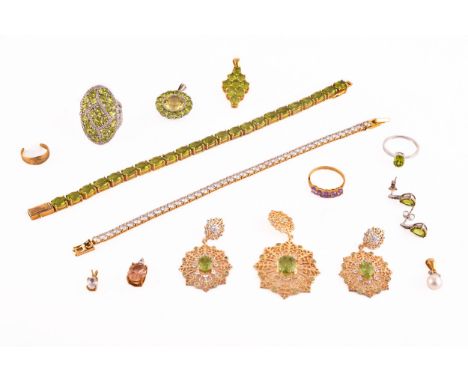 A silver gilt and peridot line bracelet, together with a CZ line bracelet (lacking one stone), a silver and peridot dress rin