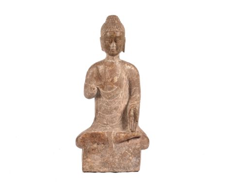 A very large and heavy 19th century Thai carved stone statue of Buddha, seated cross-legged in&nbsp;Varadamudra, with one arm