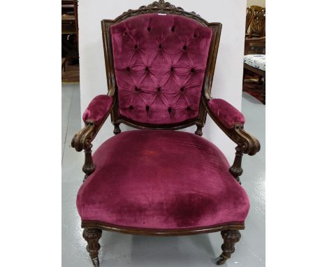 19thC Mahogany Framed Armchair, the carved pediment over two padded and scroll ended arms, on turned front legs, castors, cov