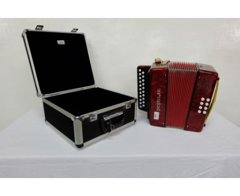 8 Base Button Accordion, red lacquer finish “Popular”, made in the Czech Republic (10 years old, never used), in a protective