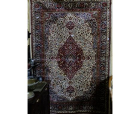 Red ground Kashmir Carpet, traditional medallion design, 2.4m x 1.55m