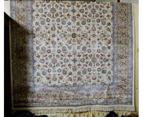 Large ivory ground Kashmir Carpet, all over floral design, gold borders, 3.30m x 2.4m