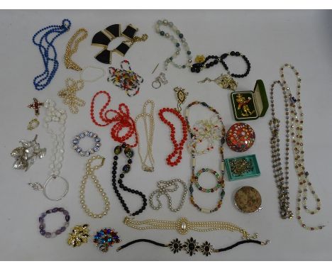 Gilt metal geometric necklace, compact, gilt metal and enamel clown brooch and various other items of costume jewelleryCondit