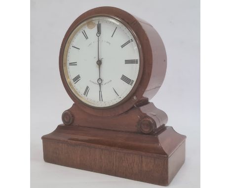 Mahogany-cased mantel clock, the circular dial with Roman numerals and indistinctly marked 