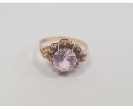 18ct gold and amethyst(?) circular set ring, the circular pale purple stone 8mm diameter, 2.4g total (ring size Q approx)