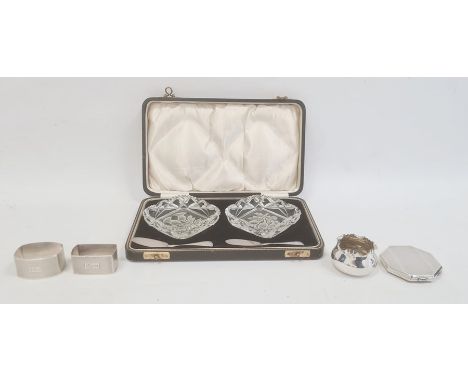 Silver compact, Birmingham 1951, of octagonal engine turned design, two silver napkin rings, small silver salt and pair of gl