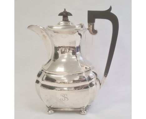 A 1930s silver coffee pot, ebony finial and handle on bun feet, Birmingham 1931, maker S Blanckensee &amp; Son Ltd, 22toz app
