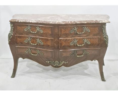 Reproduction walnut commode of serpentine form, fitted with six short drawers, with gilt metal mounts and handles, brown and 