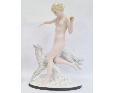 Large Royal Dux Art Deco-style tinted bisque and glazed figure of female nude throwing a ball for her Borzoi hound, oval base