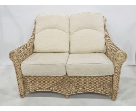 Modern conservatory-type sofa with wicker frame with cream-coloured cushionsCondition ReportHeight approx 92cmLength approx 1