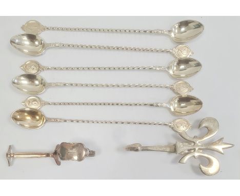 A set of six silver coloured metal cocktail spoons, numbered on finials 1 - 6, with spiral twist handles, unmarked, a Swedish