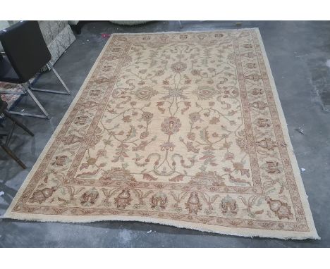 Modern light gold ground foliate design rug, 299 x 214cm
