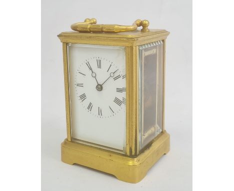 Brass carriage clock with Roman numerals to the dial
