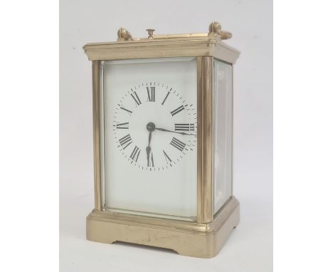 Five-sided brass and glass-cased repeater carriage clock with Roman numerals to the dial, 17cm high over the handle