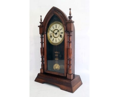 Walnut cased 20th century mantel clock, marked to interior 'Ansonia Clock U.S.' with Roman numerals to the dial, 46cm high 
