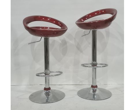 Pair of red seated plastic and chrome based breakfast bar stools (2)  please see additional imagesCondition Reportno apparent