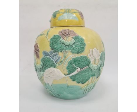 Chinese Wang Bingrong ginger jar, decorated in relief with cranes and flowering lotus, on a yellow ground and the matching co