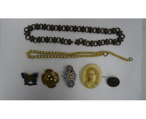 Simulated pearl necklace, enamel butterfly marked 'Bruge' to reverse, other brooches, pencil sharpener, etc (1 tin)