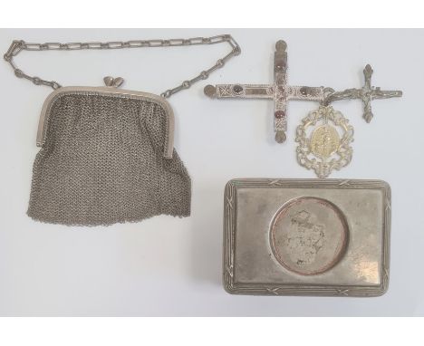 A silver chain purse, a silver coloured metal and glass rectangular trinket box, a silver coloured crucifix, a cross and pend