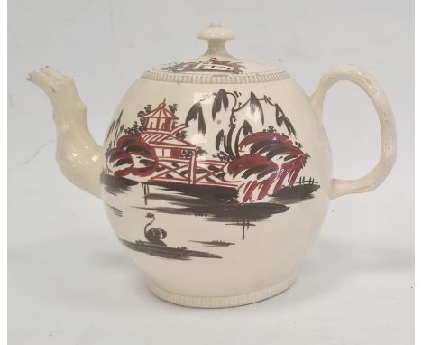 18th century English creamware teapot, the bulbous body with chinoiserie lakeside landscape in iron red and black, having cra