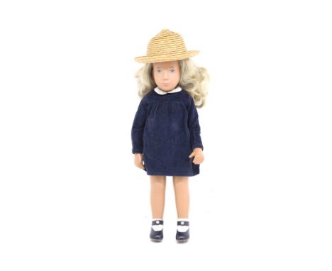 Sasha: An unboxed Trendon, Sasha doll with blonde hair and blue eyes. Height approx. 18". In very good condition, with hat. P