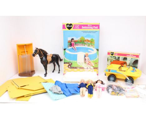 Sindy: A collection of three unboxed Sindy dolls, together with a boxed Sindy Camping Scene and Swimming Pool; and a collecti