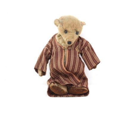 Steiff: An early 20th century Steiff bear, shoe button eyes, mohair plush, straw-filled, some damages, well loved. Height app