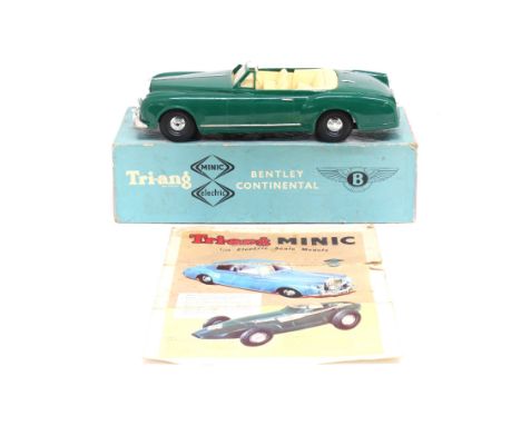 Tri-ang: A boxed Tri-ang Minic Electric, Bentley Continental, 1/20 Scale. Green livery with cream interior. Original box, sli