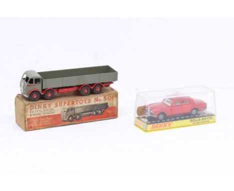 Dinky: A boxed Dinky Supertoys, Foden Diesel 8-Wheel Wagon, Reference: 501,&nbsp;grey cab, trailer and red flashes and hubs. 