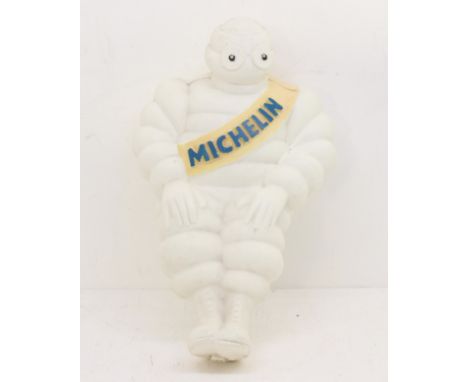 Michelin: A plastic advertising Michelin Man, most likely used as a car or lorry mascot. With yellow sash band across shoulde
