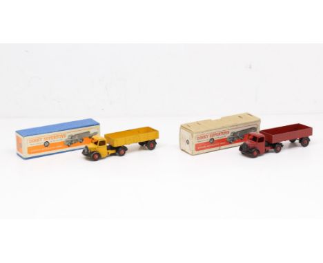 Dinky: A pair of boxed Dinky Toys, Bedford Articulated Lorry, Reference No. 521. One in yellow livery, the other in red. Orig
